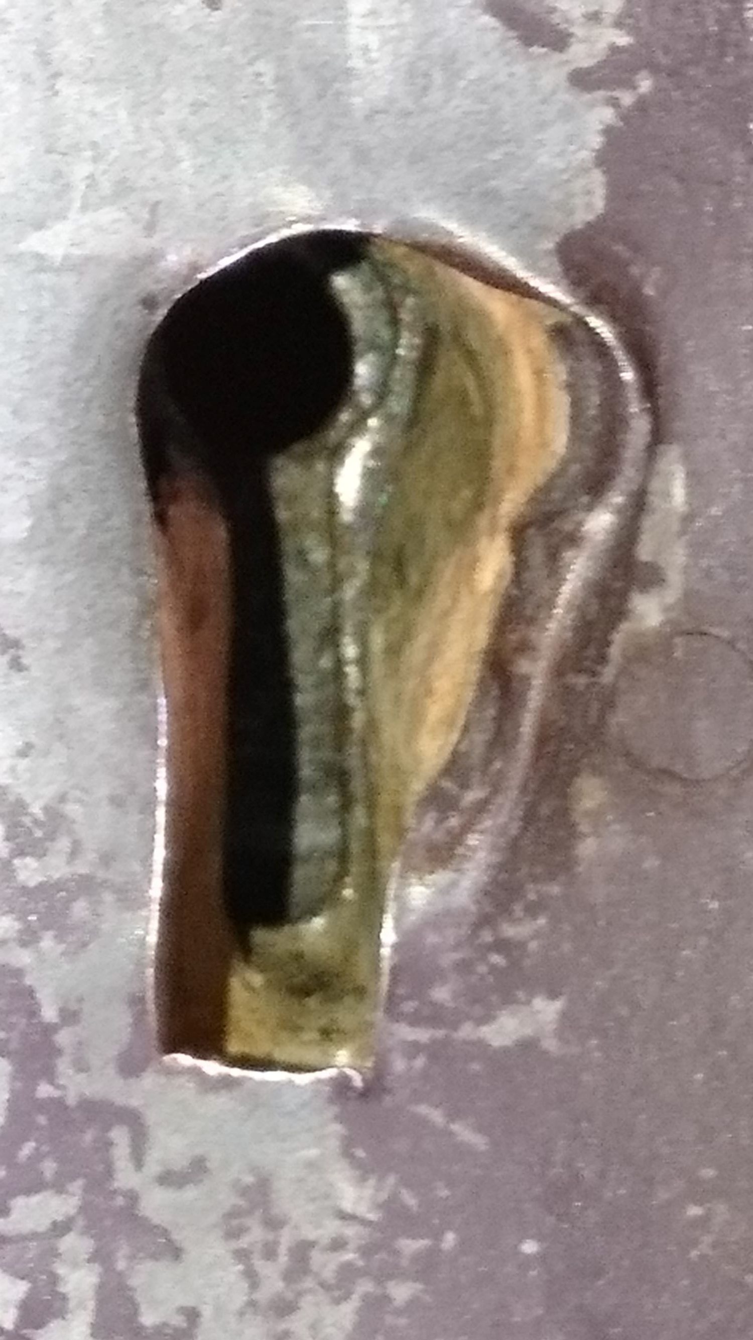 蔵の鍵の鍵穴です。　古墳みたいな形をしています